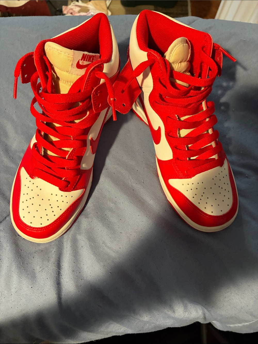 Nike Women’s Dunk Red and White High-Top Sneakers